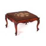 A VICTORIAN CARVED WALNUT FRAMED SQUARE STOOL
