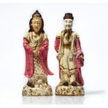 A PAIR OF UNSUSUAL ENGLISH PORCELAIN FIGURES OF A CHINESE OFFICIAL AND WIFE
