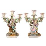 A PAIR OF FRENCH PORCELAIN THREE- LIGHT CANDELABRA