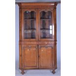 A VICTORIAN OAK FLOOR STANDING CORNER CUPBOARD