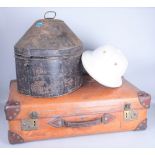 AN EARLY 20TH CENTURY PITH HELMET, CONTAINED IN A 19TH CENTURY NAVAL HAT TIN (3)