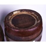 ‘CALE & CO HORNDEAN’ TWO EARLY 20TH CENTURY OAK COPPERED BARRELS (2)