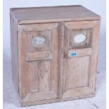 A SMALL 19TH CENTURY TWO DOOR PINE CUPBOARD