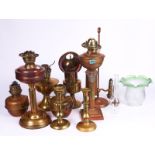 A GROUP OF VICTORIAN BRASS OIL LAMPS AND SHADES