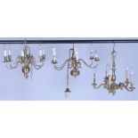 A GROUP OF THREE 20TH CENTURY BRASS CHANDELIERS (3)