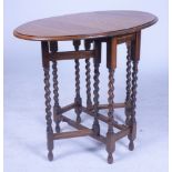 AN 18TH CENTURY STYLE OAK GATELEG TABLE