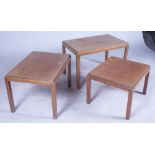 ‘GORDAN RUSSELL’ A MID 20TH CENTURY WALNUT NEST OF THREE TABLES