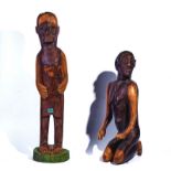 TRIBAL INTEREST; A LARGE CARVED HARDWOOD FIGURE OF A STANDING MAN (3)