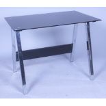 A MODERN CHROME AND SMOKED GLASS SIDE TABLE