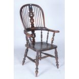 A LATE 19TH CENTURY ASH AND ELM WINDSOR ARMCHAIR