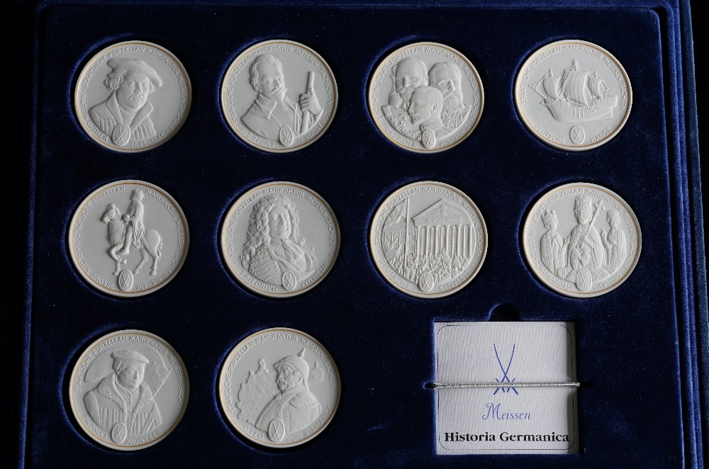 A CASED SET OF TEN MEISSEN WHITE BISCUIT COMMEMORATIVE COINS