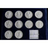 A CASED SET OF TEN MEISSEN WHITE BISCUIT COMMEMORATIVE COINS