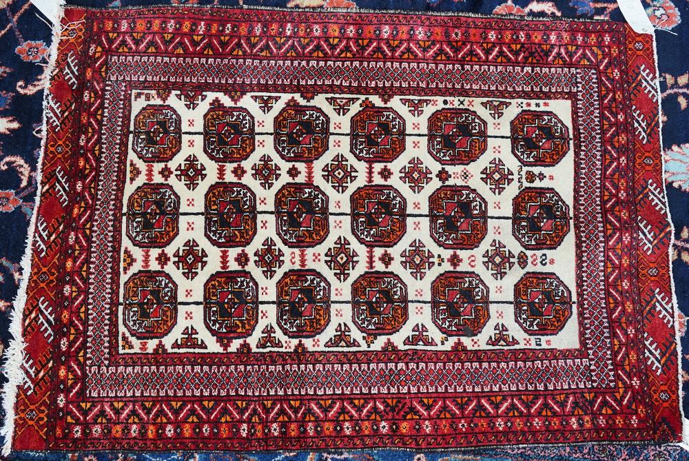 AN INDIAN BOKHARA RUG AND TWO OTHERS (3)