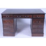 A MODERN STAINED BEECH PEDESTAL DESK