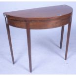 A GEORGE III MAHOGANY FOLDOVER CARD TABLE