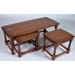 ERCOL; A NEST OF THREE ELM OCCASIONAL TABLES (3)