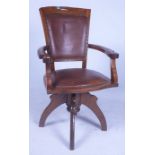 AN EARLY 20TH CENTURY OAK OFFICE ARMCHAIR