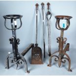 A PAIR OF STEEL ANDIRONS 44CM HIGH AND A SET OF THREE FIRE IRONS