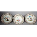 A PAIR OF MEISSEN PORCELAIN BOWL BOWLS DECORATED WITH BIRDS AND PIERCED DECORATION (3)