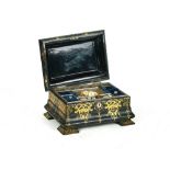 A VICTORIAN GILT DECORATED AND PAINTED PAPIER-MÂCHÉ SEWING BOX