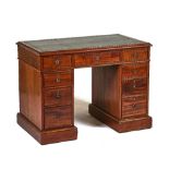 A 19TH-CENTURY MAHOGANY PEDESTAL DESK