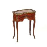 A LATE 19TH CENTURY FRENCH GILT METAL-MOUNTED KINGWOOD MARQUETRY INLAID KIDNEY-SHAPED VITRINE...