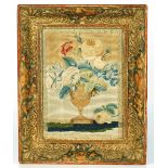 A SILK EMBROIDERED PANEL DEPICTING A FLOWER-FILLED VASE