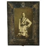 A GERMAN SILVER MOUNTED PHOTOGRAPH FRAME AND A STUDIO PHOTOGRAPH OF WILHELM II