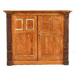 A 19TH-CENTURY PINE TRIPLE PANEL TWO-DOOR SIDE CABINET