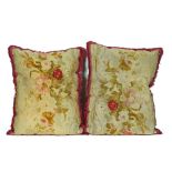 A PAIR OF FRENCH AUBUSSON COVERED CUSHIONS