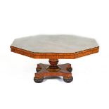 A REGENCY ROSEWOOD OCTAGONAL TABLE