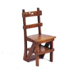 AN OAK GOTHIC REVIVAL METAMORPHIC CHAIR