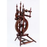 A 19TH CENTURY BEECH AND FRUITWOOD SPINNING WHEEL