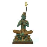 A PATINATED & GILT BRONZE MODEL OF A THAI MUSICIAN