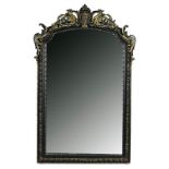 A 19TH CENTURY PARCEL-GILT EBONISED ARCH TOP OVERMANTEL MIRROR