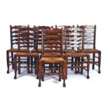 A MATCHED SET OF EIGHT LANCASHIRE LADDER BACK DINING CHAIRS (8)