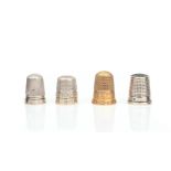 A 9CT GOLD THIMBLE AND THREE FURTHER THIMBLES (4)