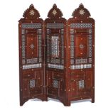 A 19TH CENTURY NORTH AFRICAN MOTHER-OF-PEARL INLAID HARDWOOD THREE FOLD DRAUGHT SCREEN