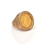 A 9CT GOLD MOUNTED HALF SOVEREIGN RING