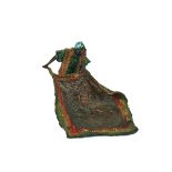 A POLYCHROME COLD PAINTED BRONZE MODEL OF A CARPET SELLER