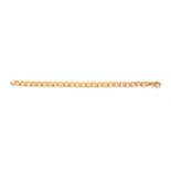 A 9CT GOLD FACETED CURB LINK BRACELET