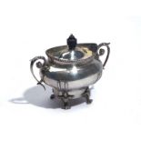 A SILVER TEA CADDY