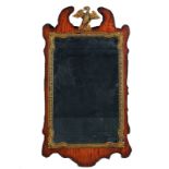 AN 18TH CENTURY STYLE PARCEL-GILT FRET CARVED PIER GLASS