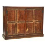 A 17TH CENTURY AND LATER OAK CUPBOARD