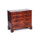 A GEORGE III SERPENTINE MAHOGANY CHEST