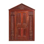 AN EARLY 19TH-CENTURY MAHOGANY AND TEAK MINIATURE DOOR FACADE