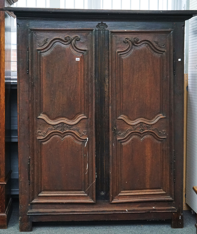 A LATE 18TH CENTURY FRENCH CHESTNUT ARMOIRE
