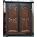 A LATE 18TH CENTURY FRENCH CHESTNUT ARMOIRE