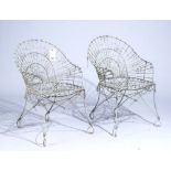 A PAIR OF 20TH CENTURY WHITE PAINTED WIRE-WORK ‘PEACOCK’ TUB CHAIRS