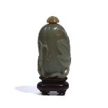 A CHINESE CELADON JADE SNUFF BOTTLE